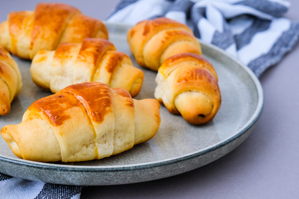 homemade delicious croissants dessert gray plate kitchen towel tasty homemade buttery